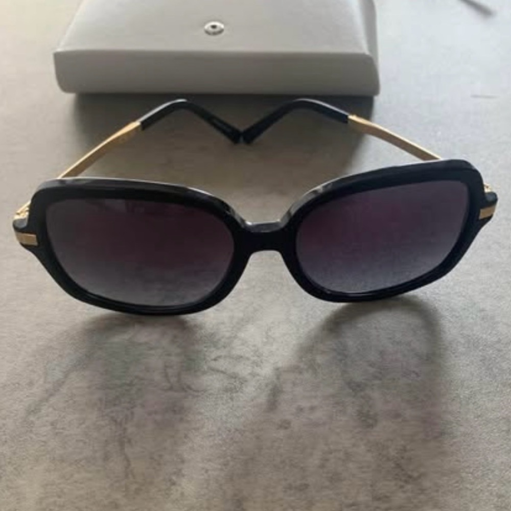 Michael Kors Black and Gold Sunglasses with Sleek Design